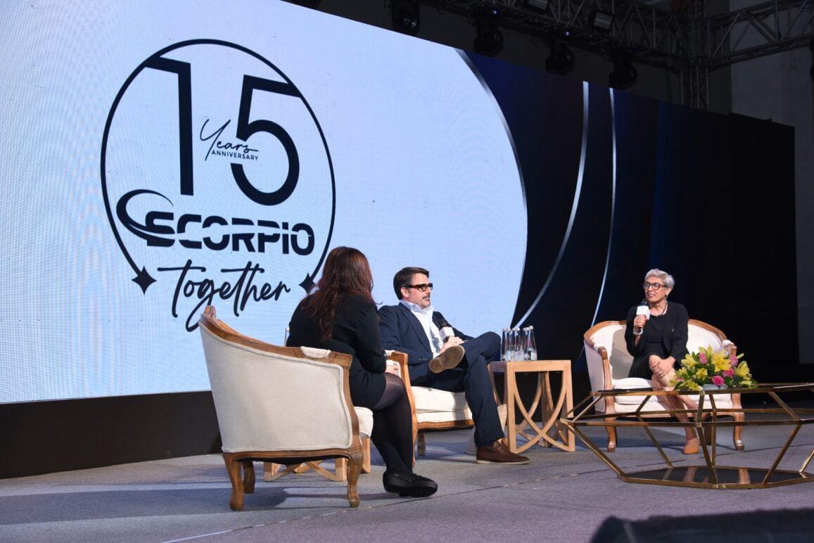 A stage with seats where an interview is taking place.