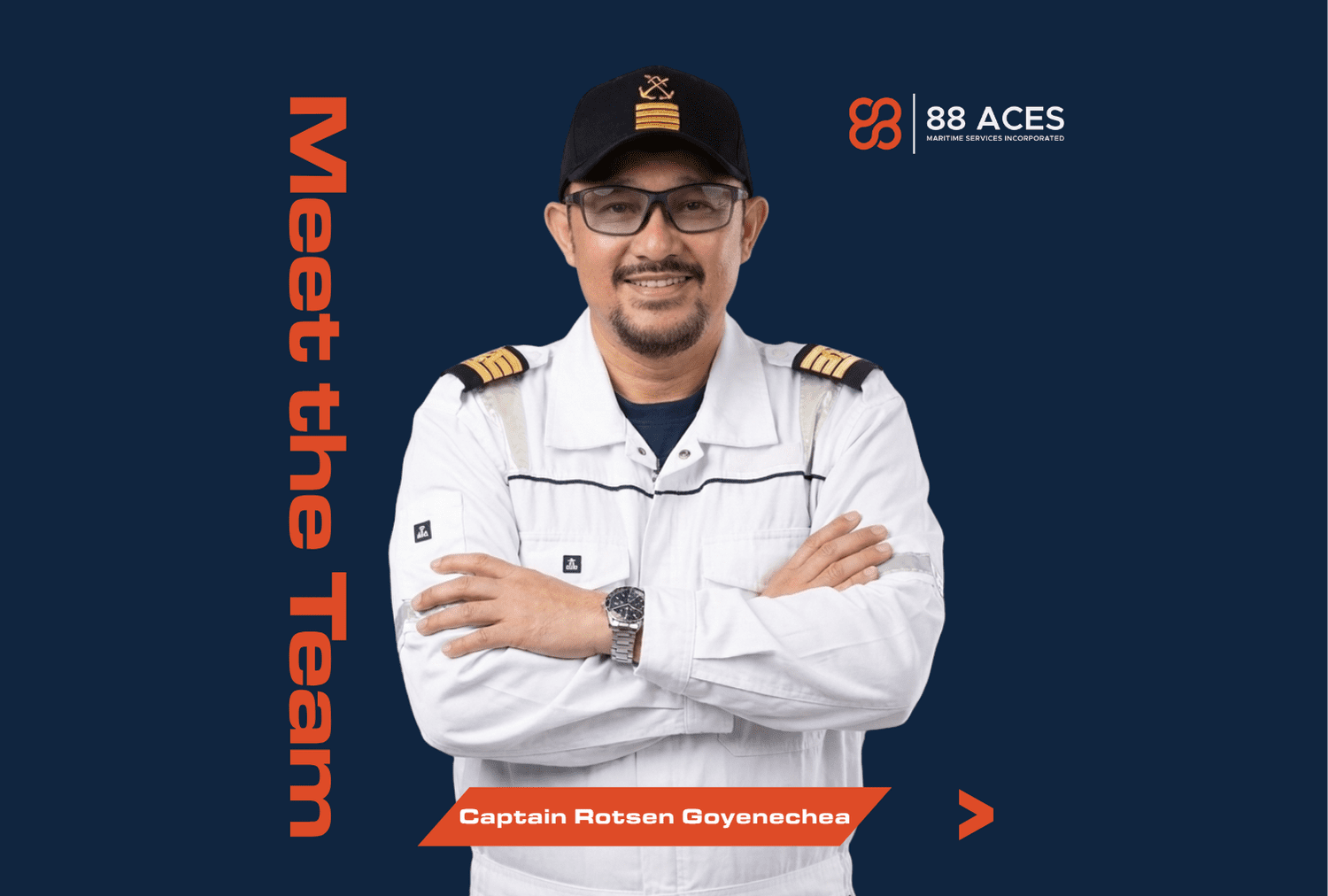 Man standing with arms crossed with a blue background