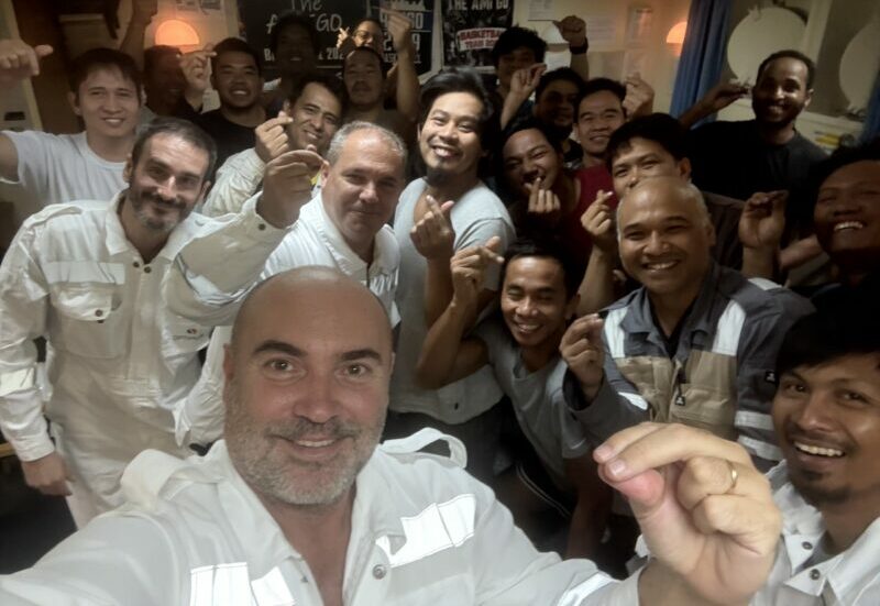 Captain Panagiotis Bitsakis with crew members