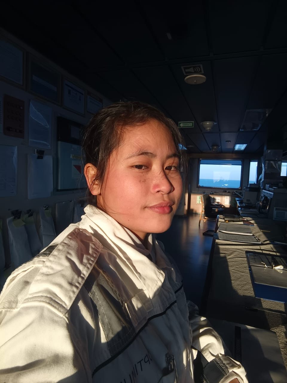 A selfie of a female seafarer